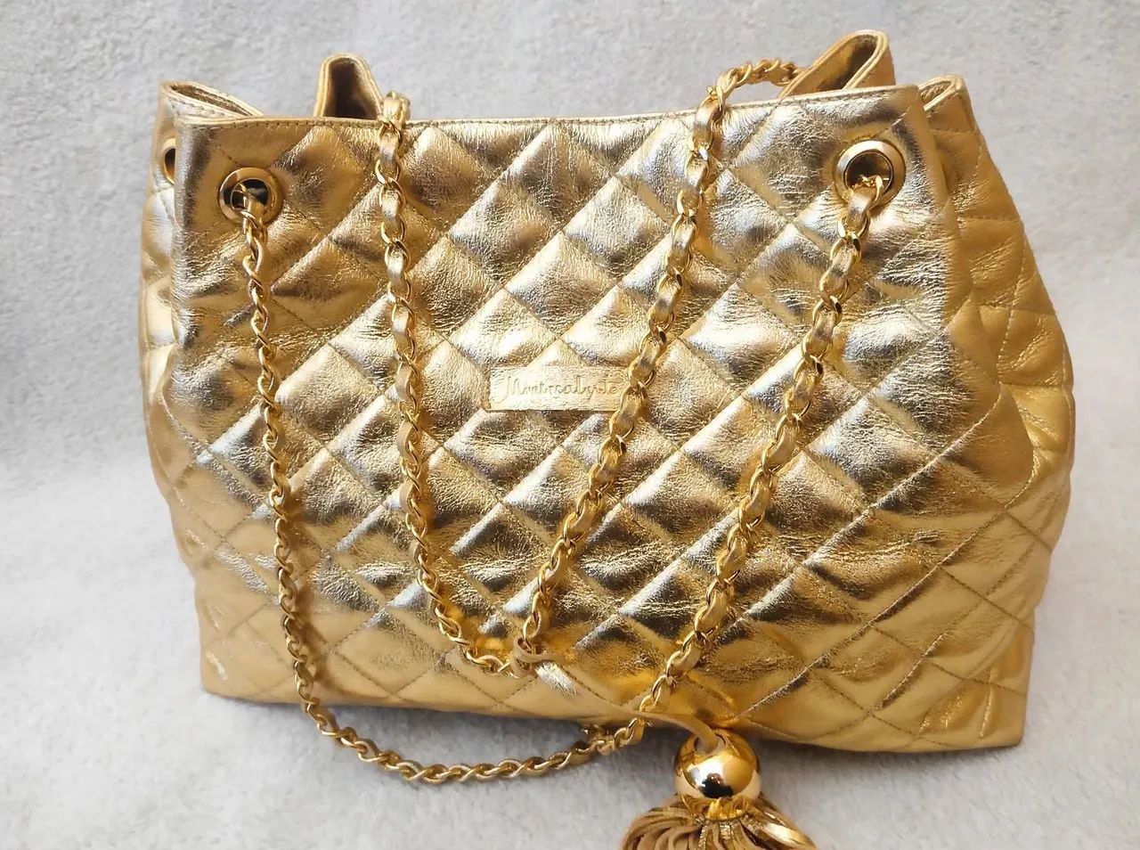 BOLSA DOURADA DE COURO