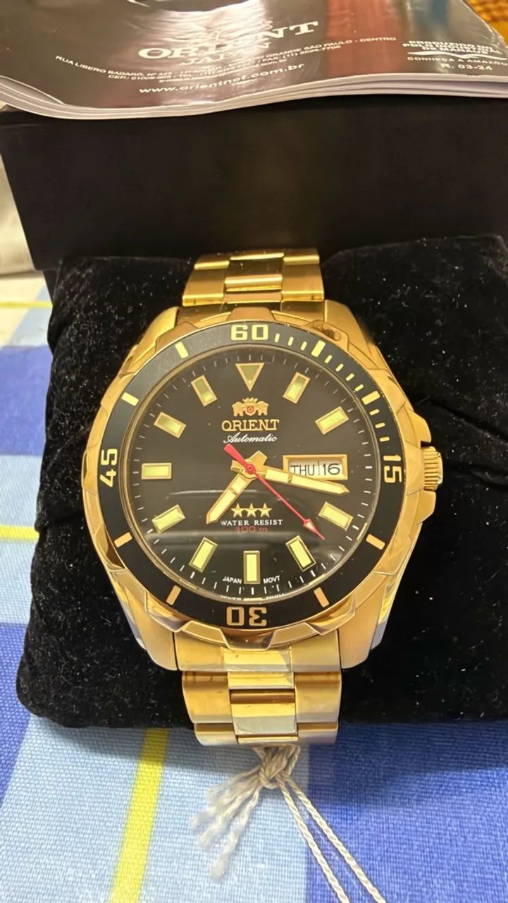Relógio Oriente automático 3 estrelas dourado e preto