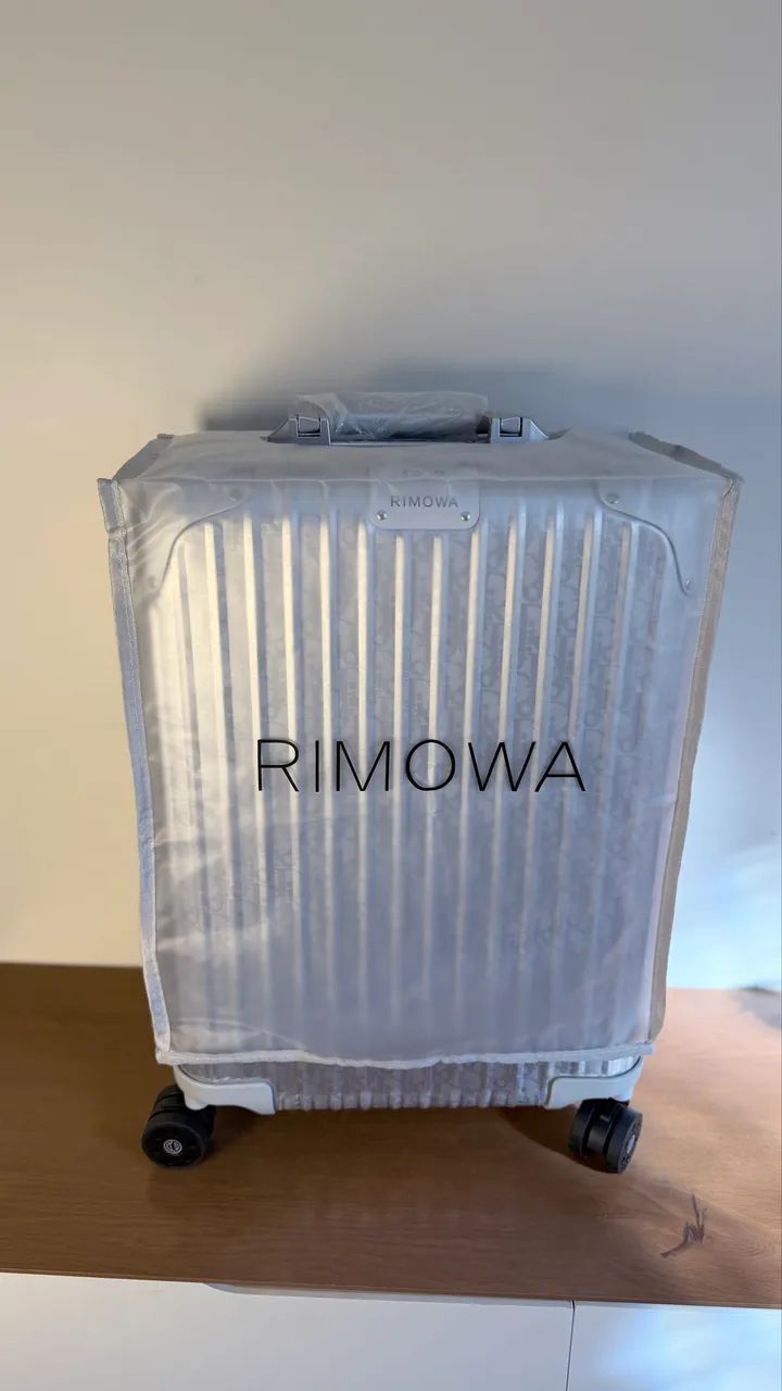 Mala Rimowa Dior alumínio 