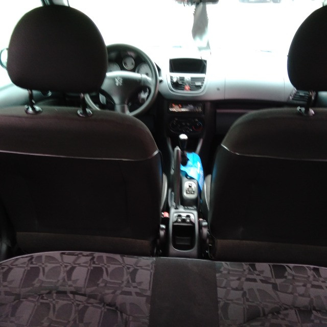 ? Peogeot Sport XR 207 1.4 2010 ?