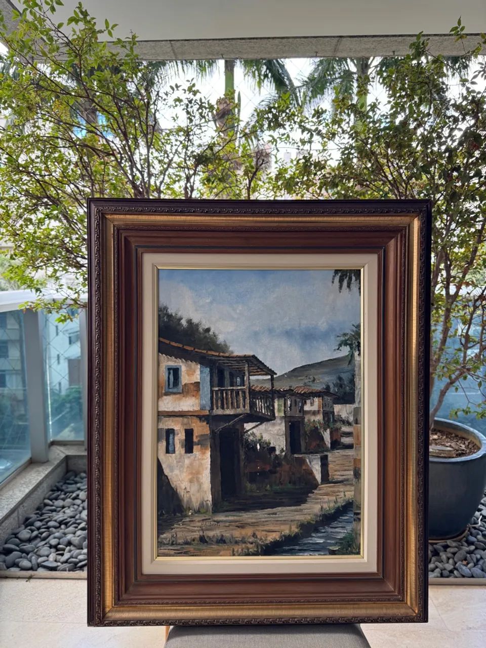 Quadro com pintura de paisagens
