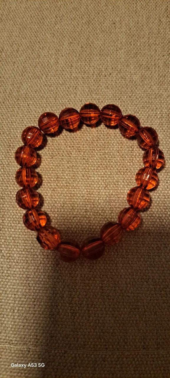 Pulseira elastica vermelha