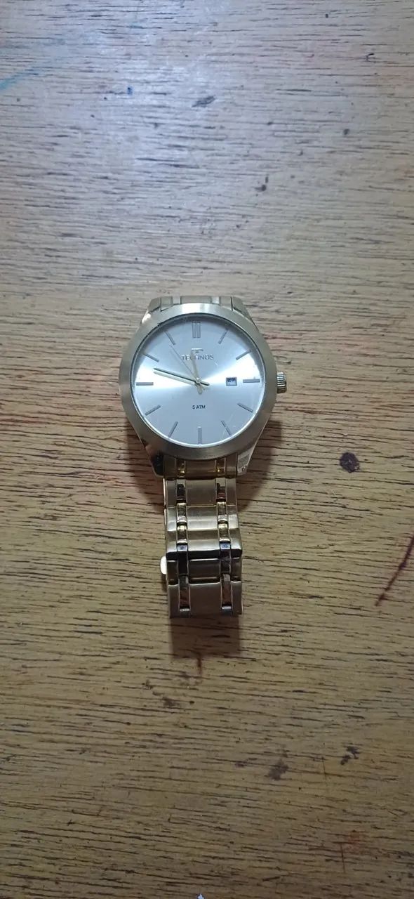 Relógio unisex dourado