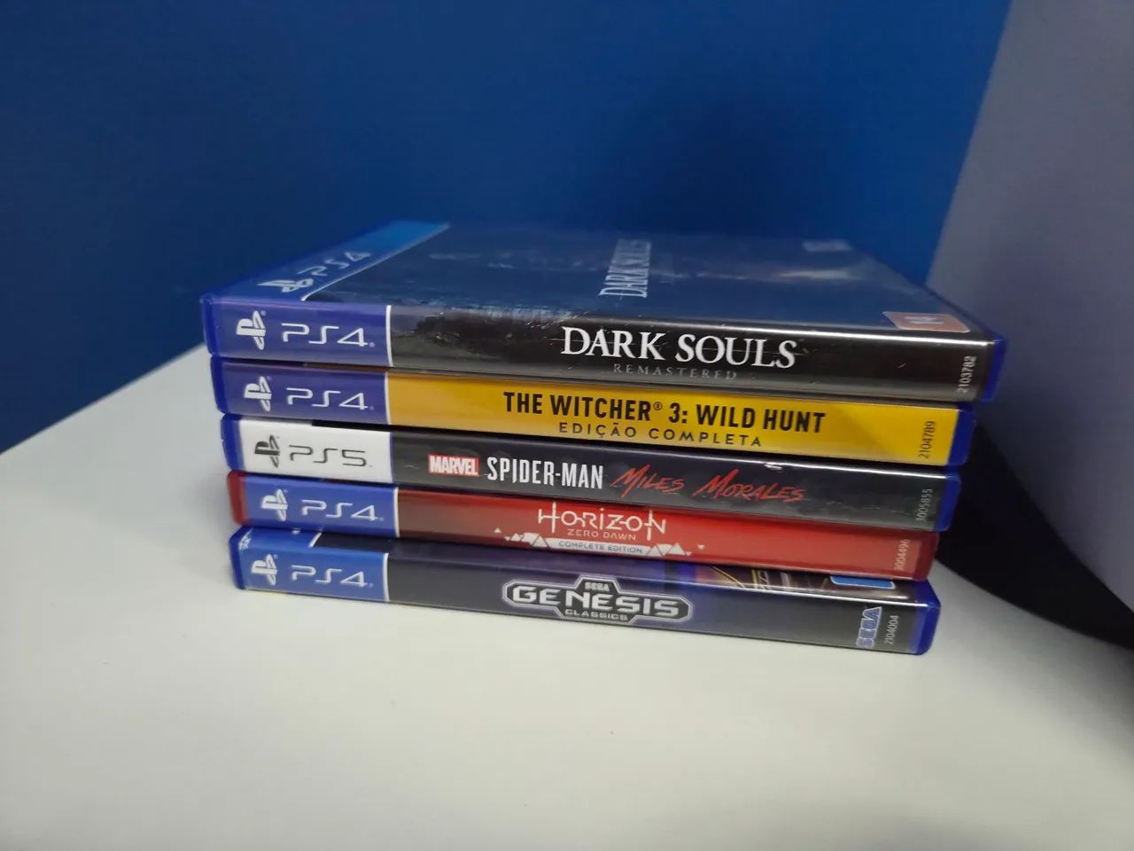 PS5 , em perfeito estado. Com 4 jogos e 2 controles - Foto 2