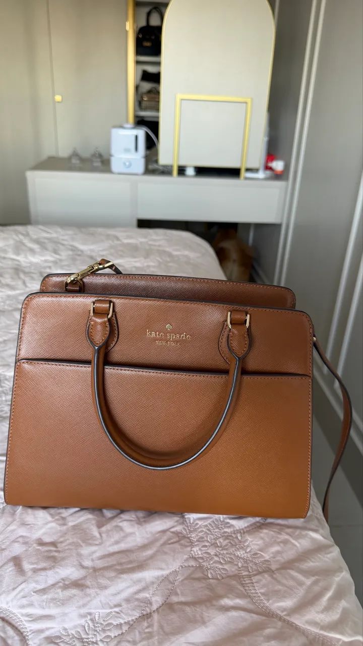 Vendo Bolsa Kate Spade de couro semi nova .