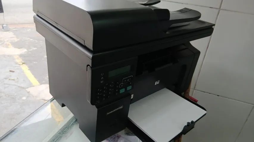 Impressora Laser Multifuncional HP M1212NF - Foto 2