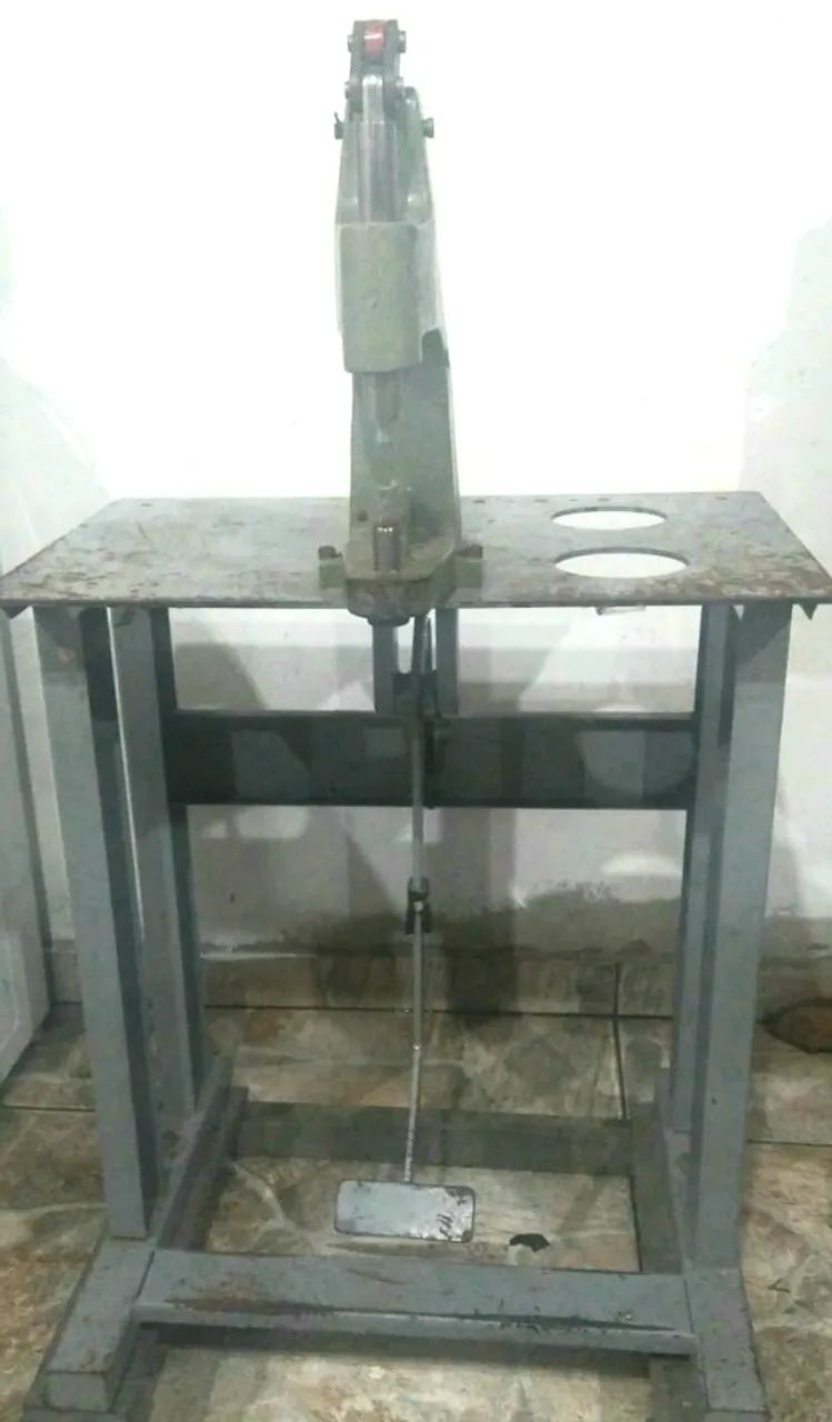 Máquina de ilhos