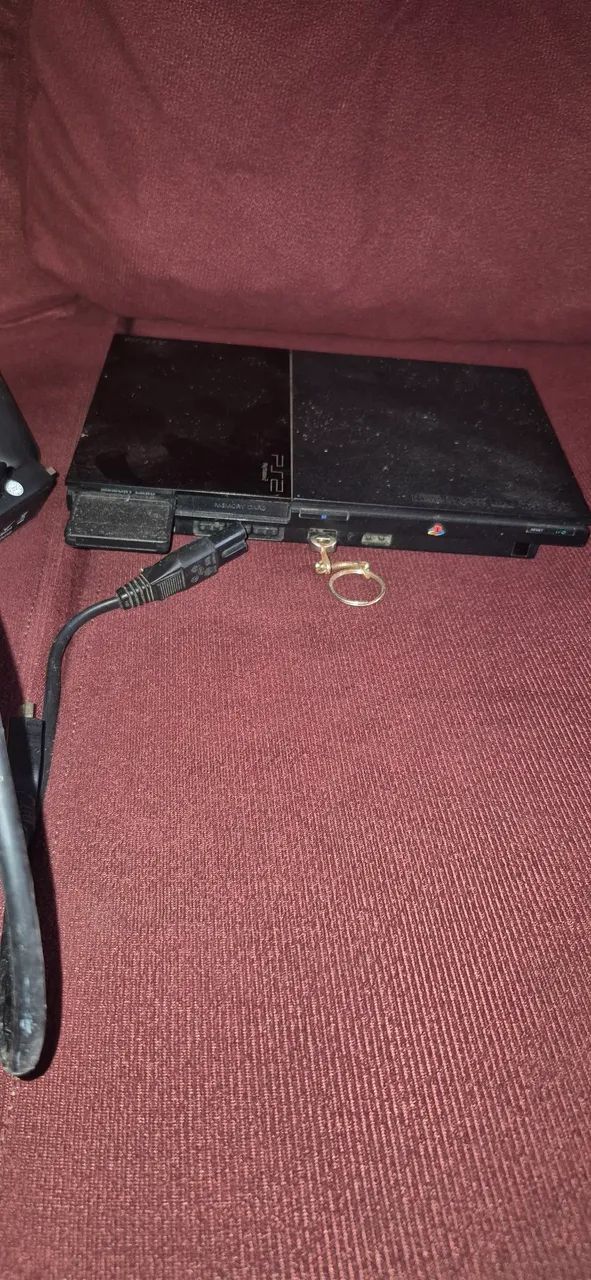 Ps2 n abri o jogo, pra conserto