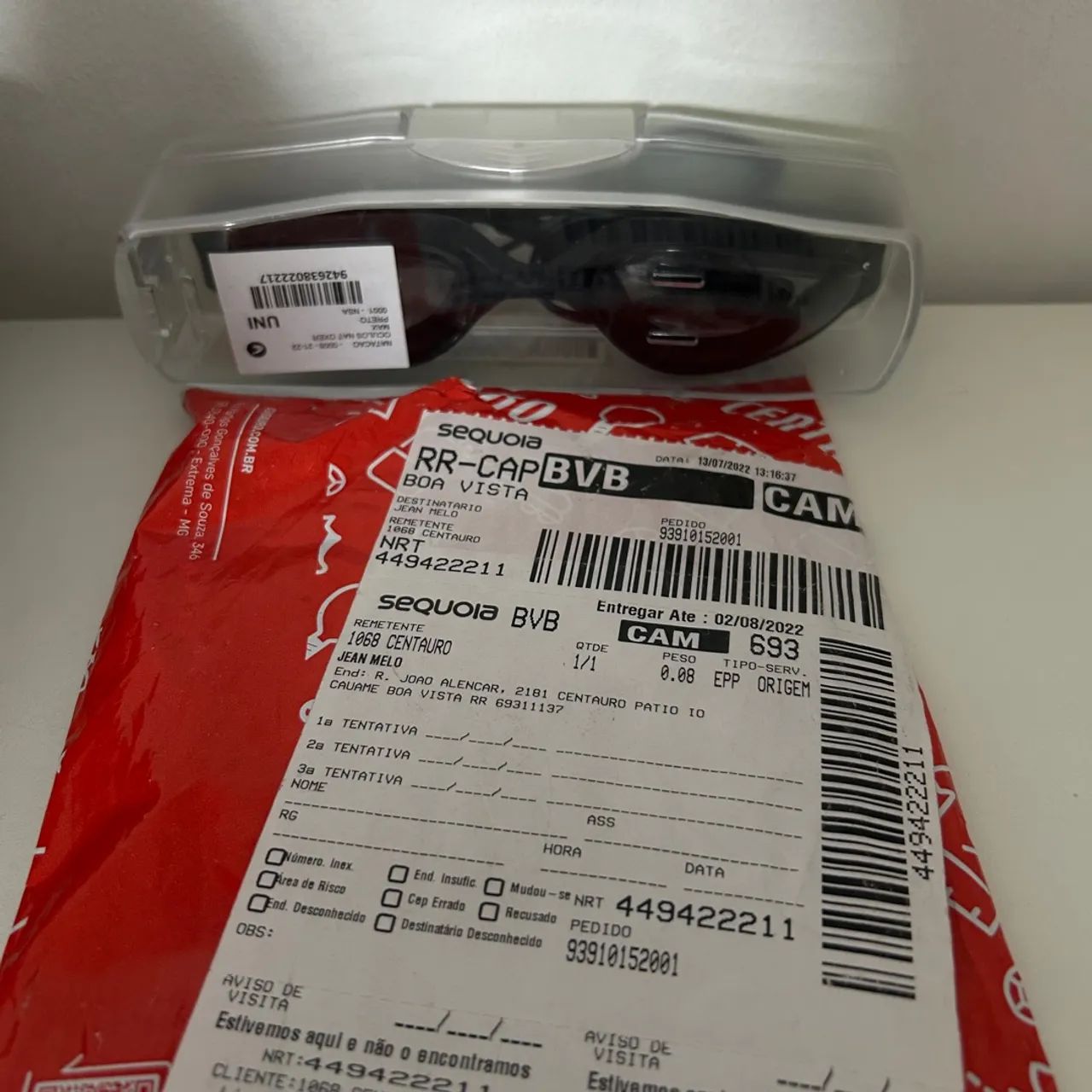 Óculos e toca de natação 