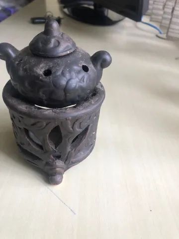 Queimador de incenso e essência em óleo.