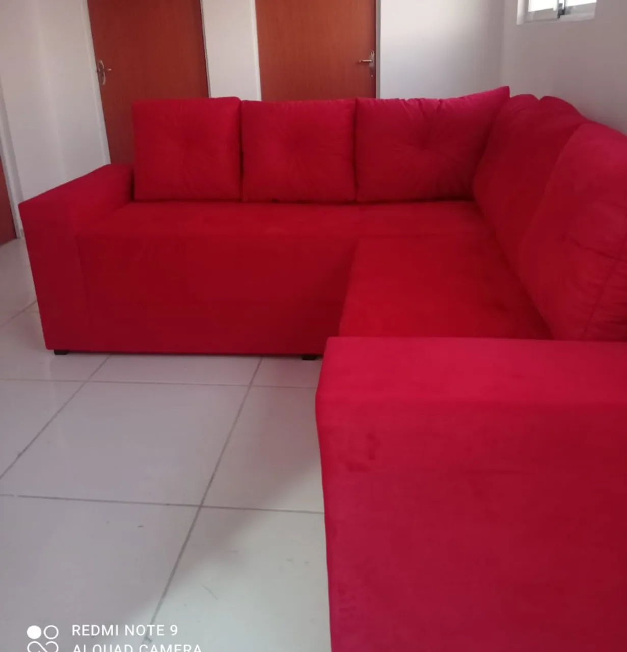 Sofá de canto vermelho