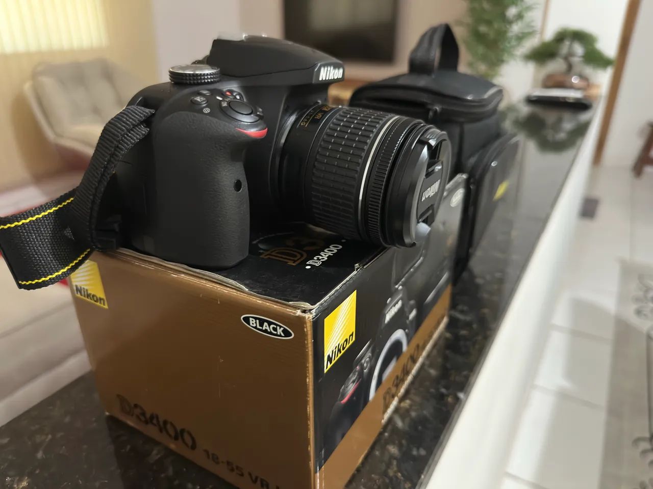 Câmera Nikon D3400 NA CAIXA com lente e acessórios + BRINDE - Foto 3