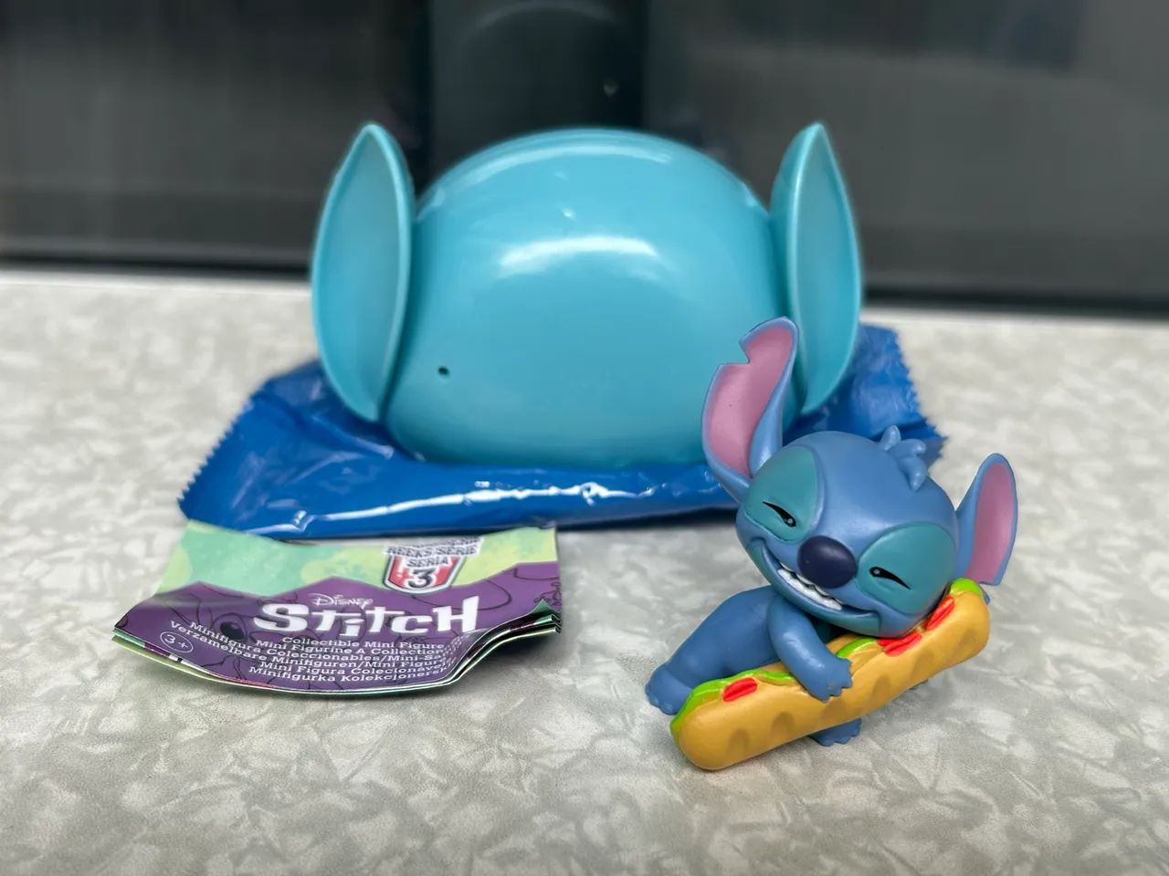 Stitch Disney - Cápsula com Mini Boneco - Série 3 - Sunny - Foto 5