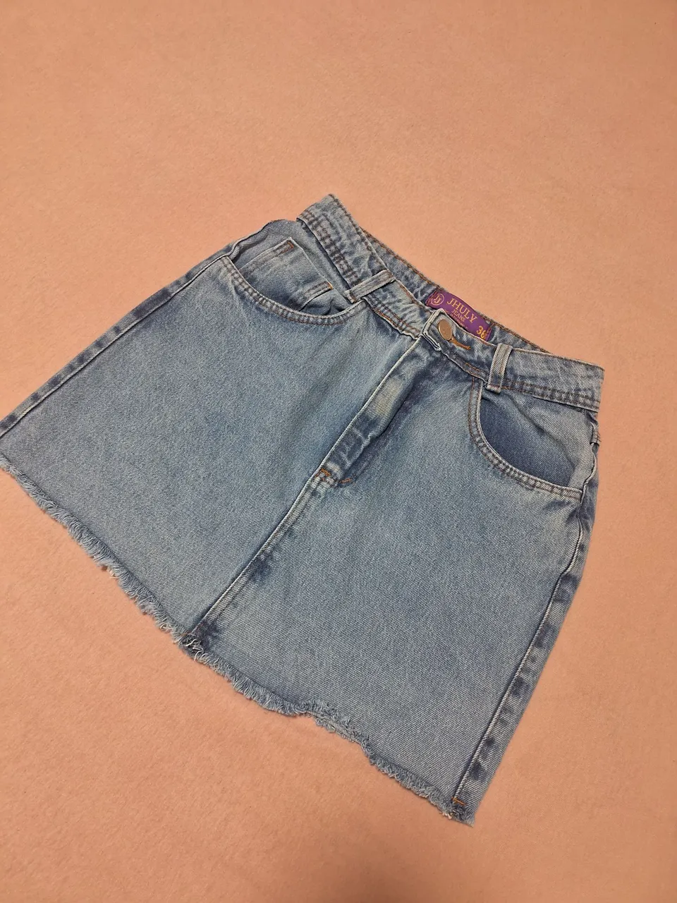 Saia Jeans Juhly - 36. O short veste 34 é usado