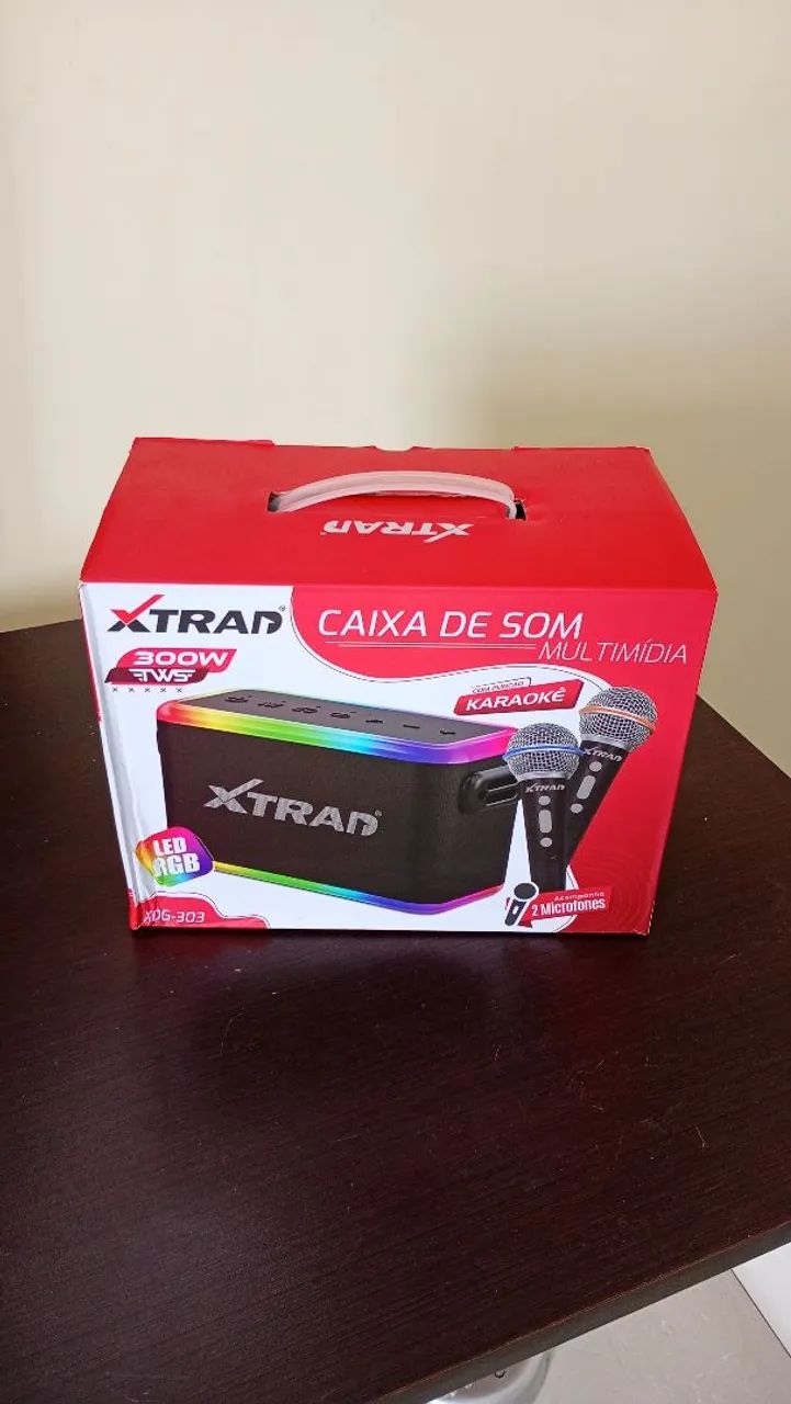 Caixa de som potente com 2 microfones bluetooth. Nova entrego *