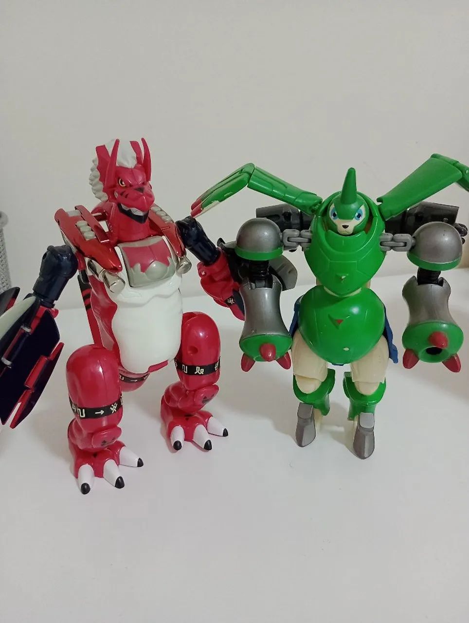 Boneco Digimon Digivolving Growmon e Gargomon 