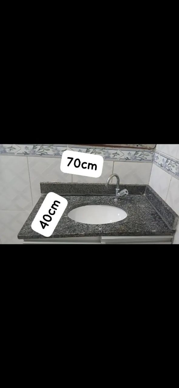 Marble countertop with sink and faucet