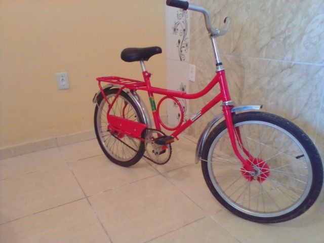 Bicicleta antiga monark barra circular aro 20 vermelha - Foto 4