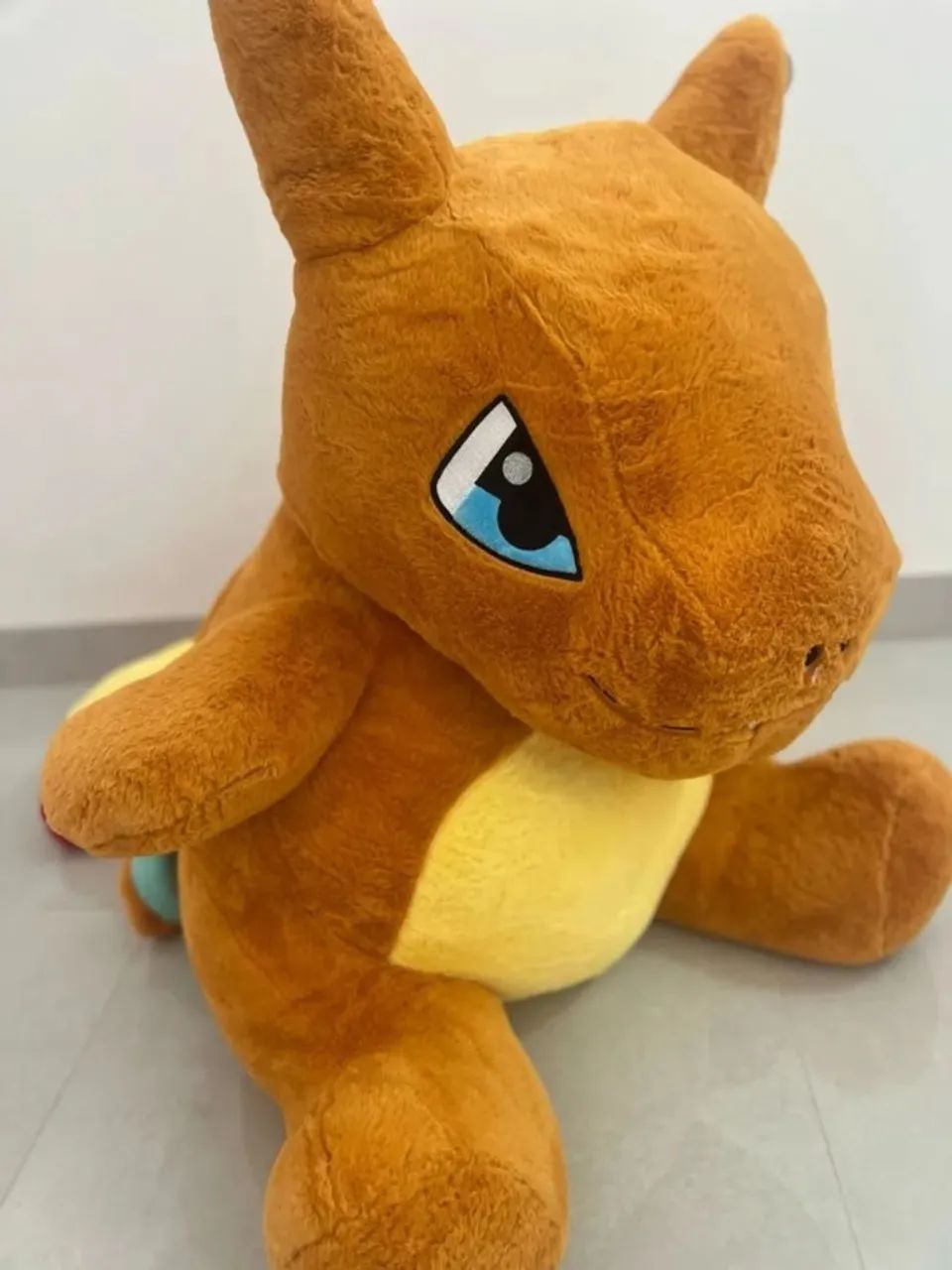 bicho de pelucia pokemon charizard 