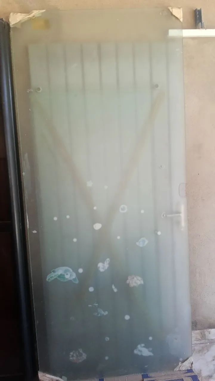 Vende-se porta de vidro $ 699