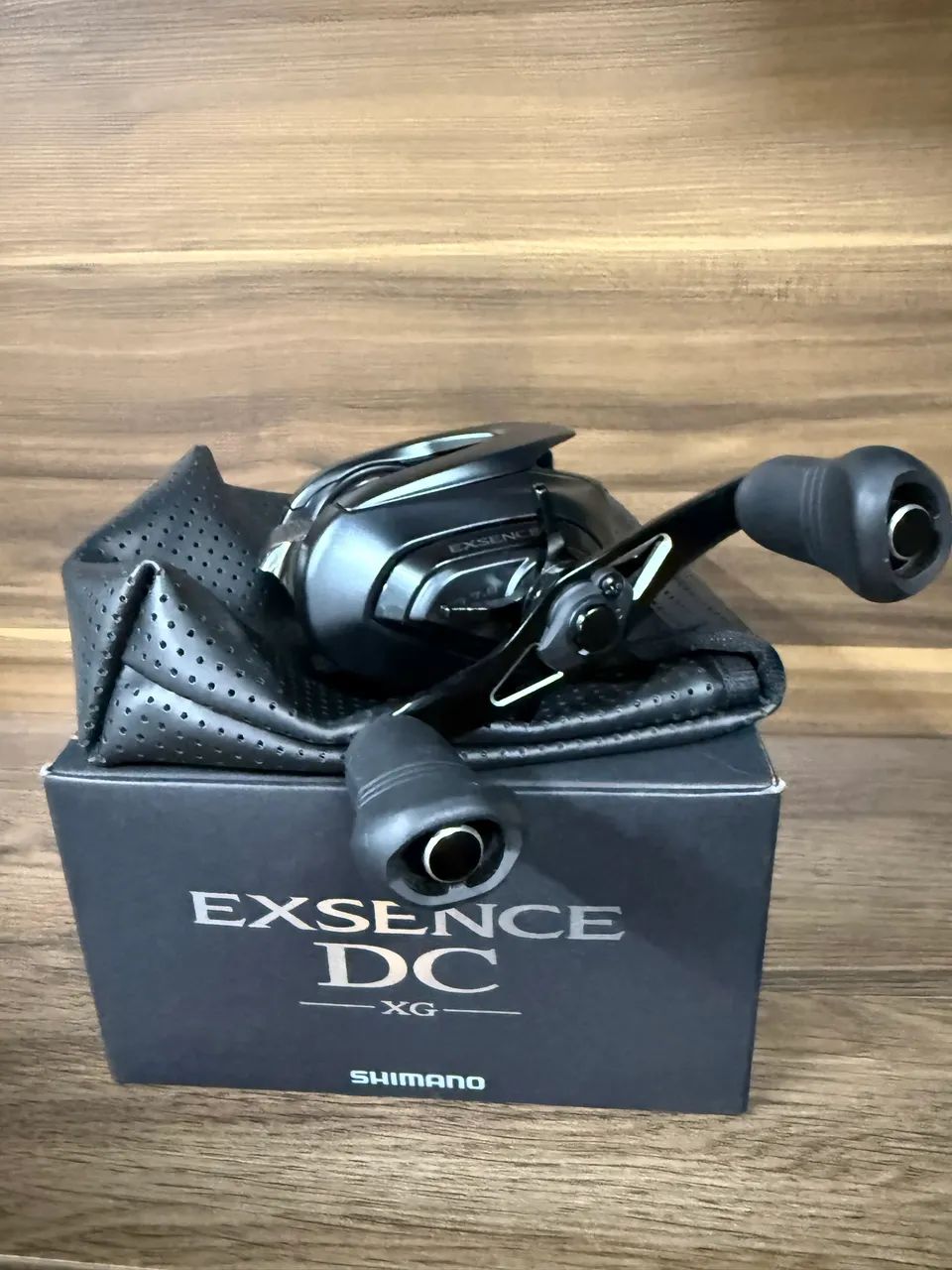Carretilha Shimano Exsence Dc Xg Left Cor Preto Lado Da Manivela