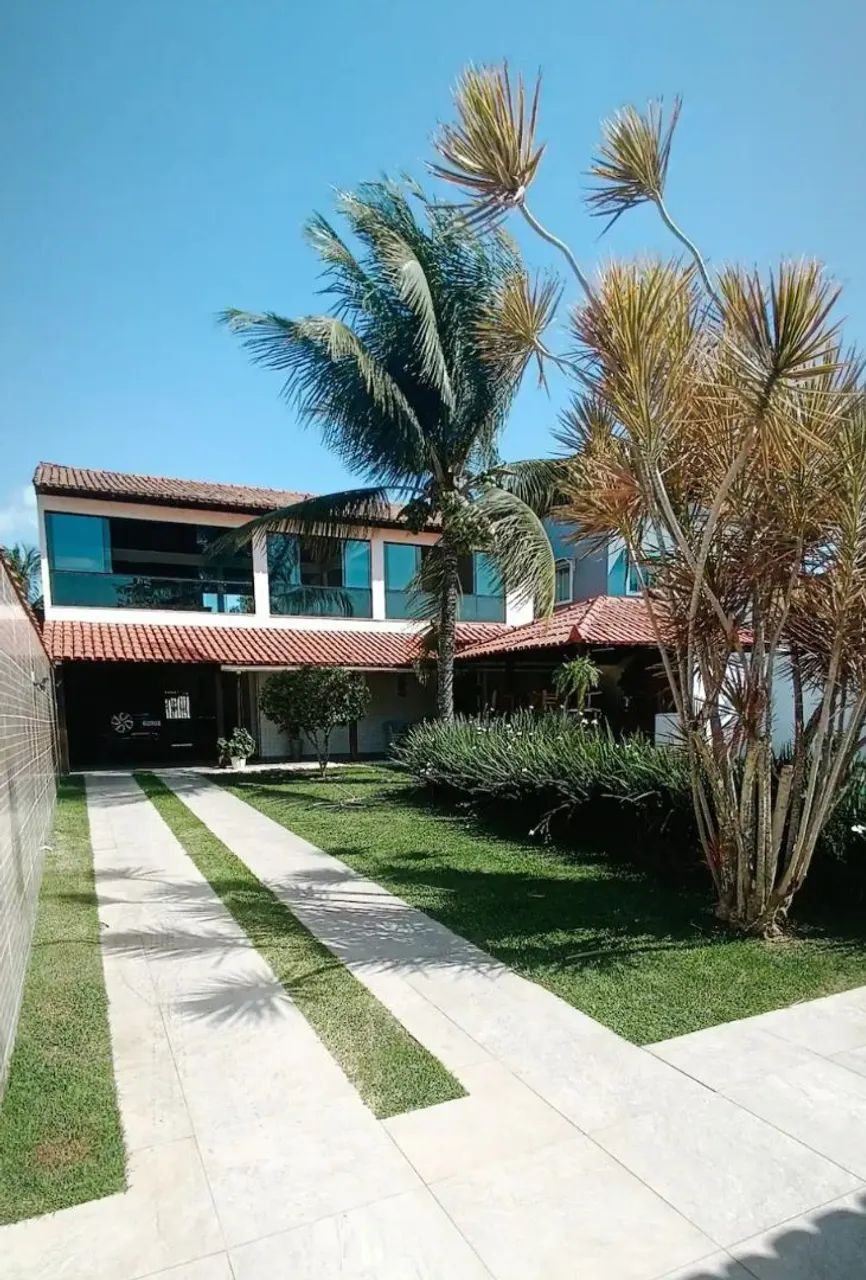 Casa de praia em Vila Velha com ar condicionado piscina churrasqueira área de jogos .