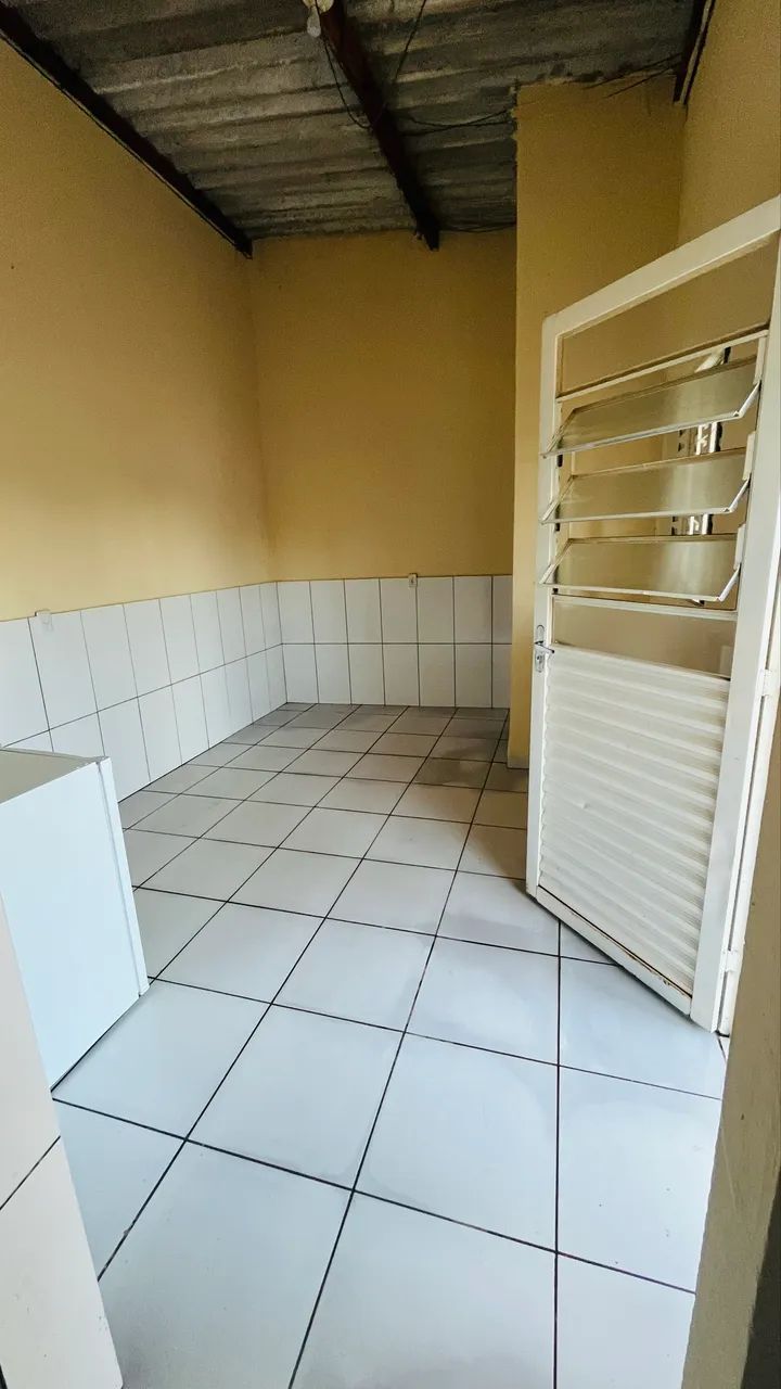 Vendo terreno com duas casas