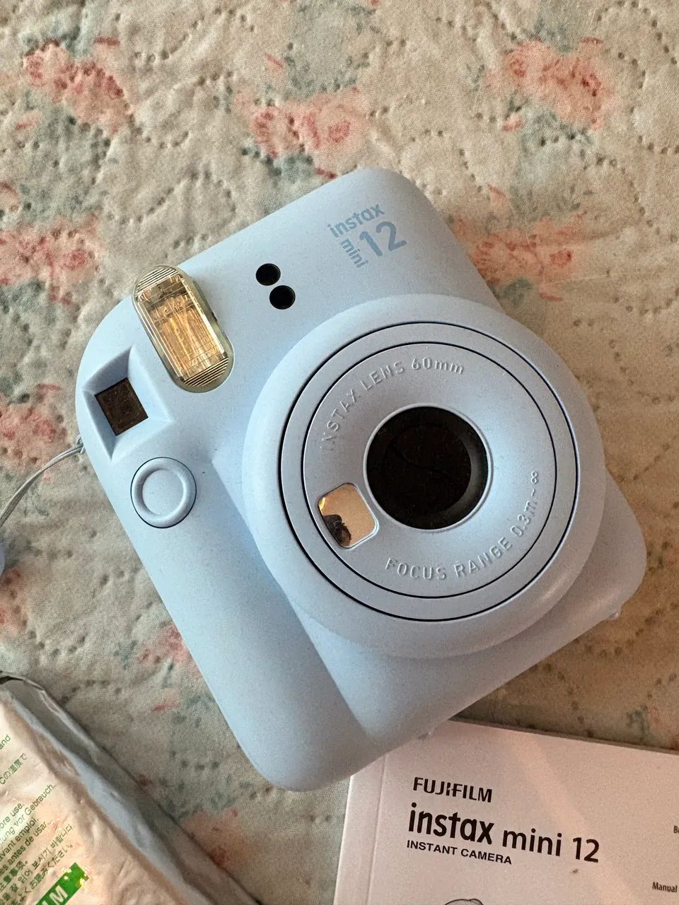 Instax mini 12 azul candy + pack de 10 poses