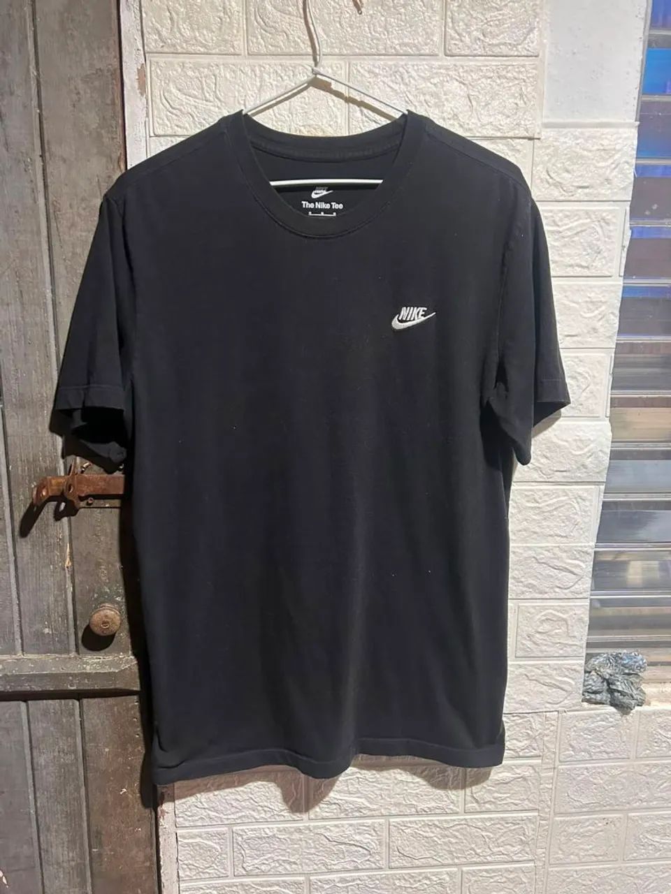 Camiseta da Nike, duas por 100