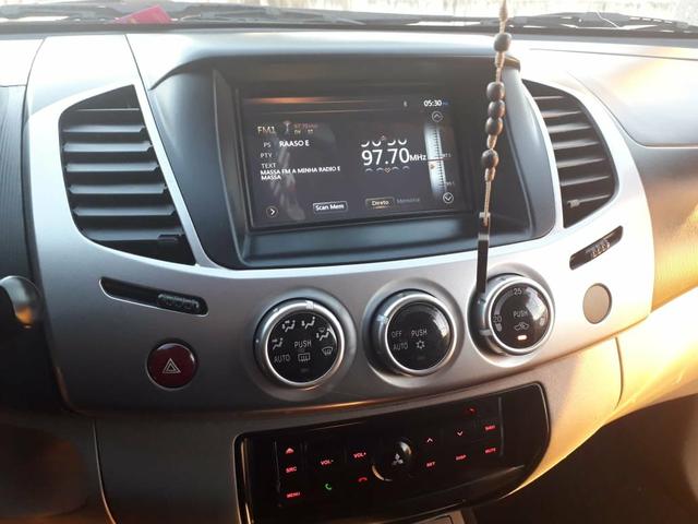 Vendo troco L200 HPE apenas 85 mil km diesel - Foto 9