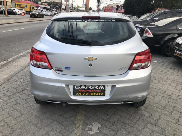 Ônix 2018 28000 km ent: 1.990,00 + 990,00 - Foto 12