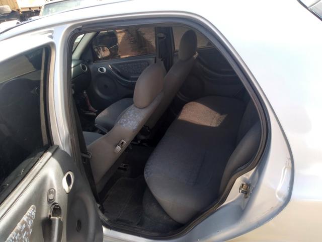 Vendo celta filé com ar troco por Corsa joy - Foto 3