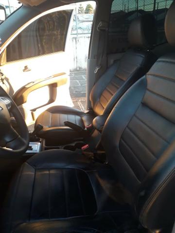 Vendo troco L200 HPE apenas 85 mil km diesel - Foto 6