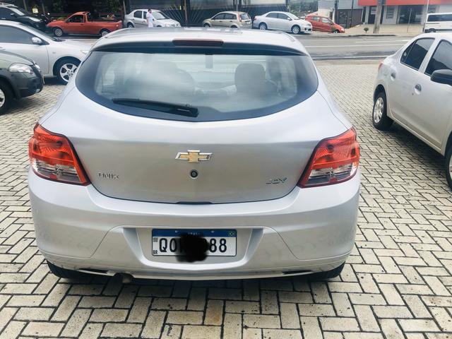 Onix Joy 1.0 2018 único dono baixo km - Foto 4