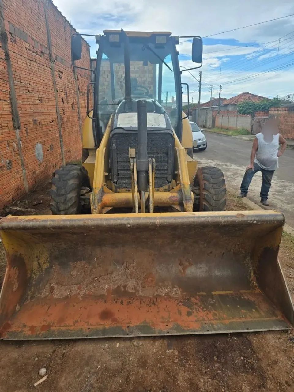 Retroescavadeira Caterpillar 416E ano 2014, traçada 4x4, toda operacional