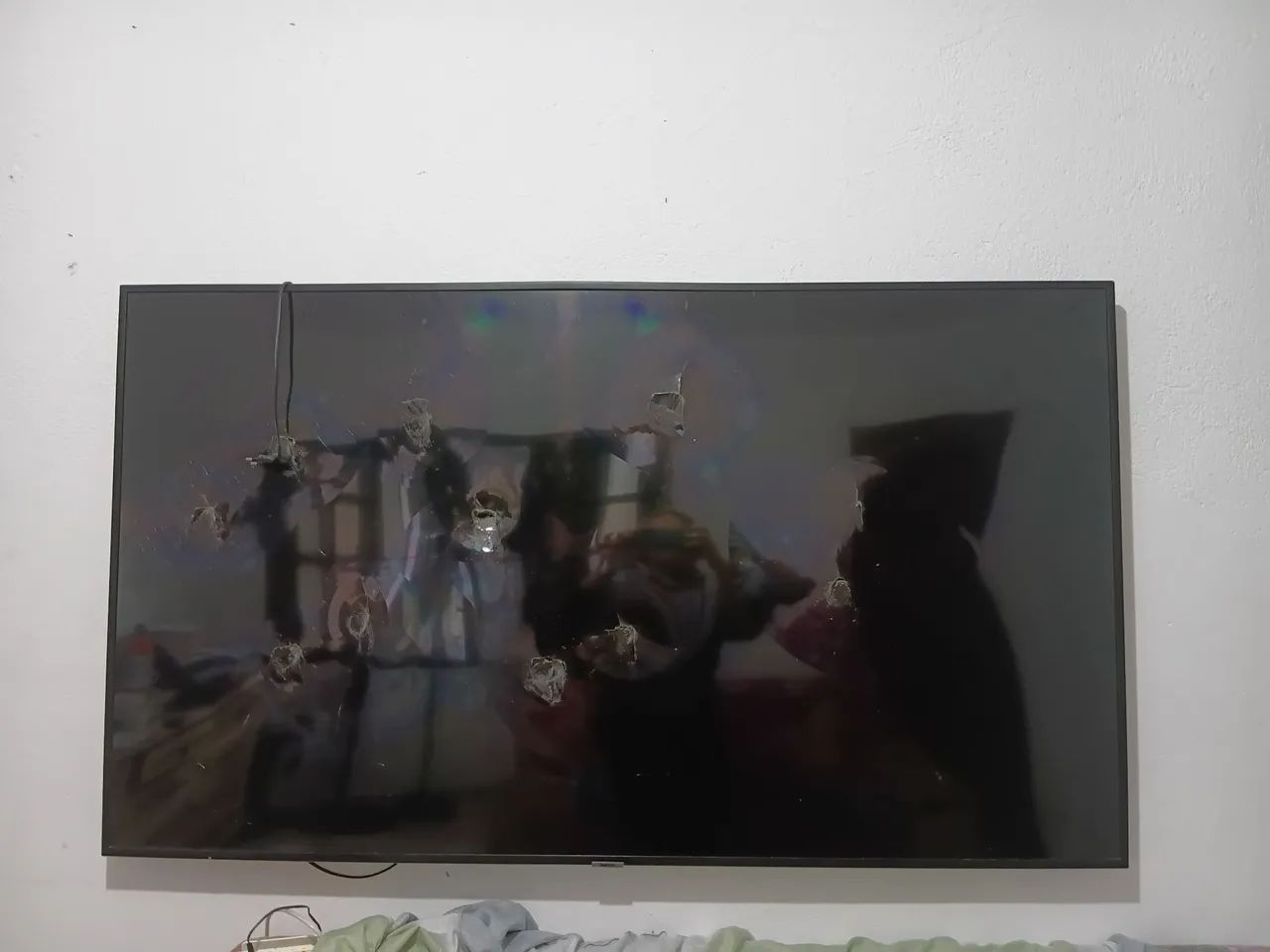 TV com.tela quebrada