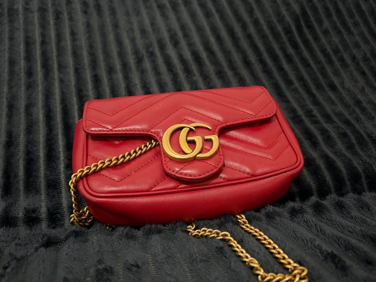 Gucci GG Marmont Super Mini Matelassé em couro 