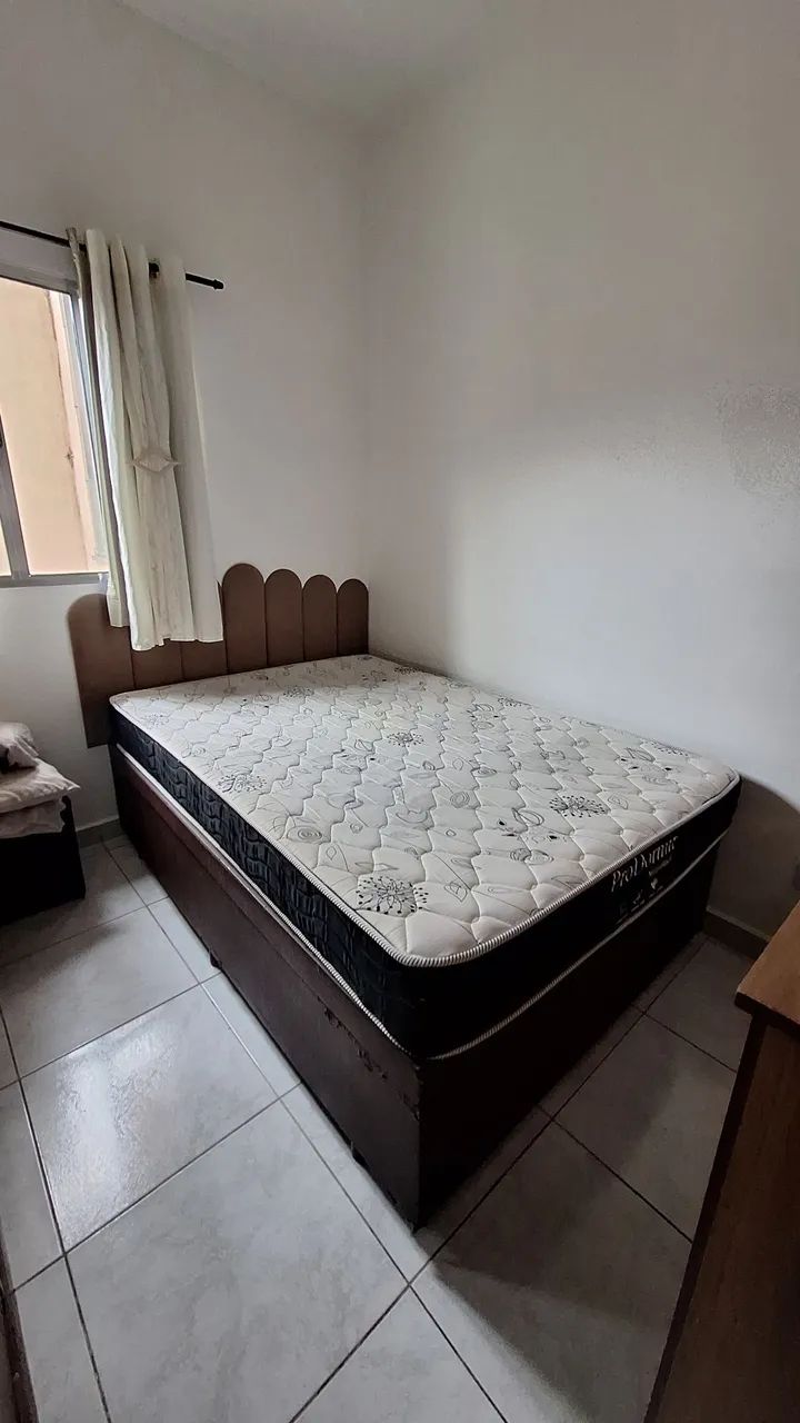 Cama box baú casal com colchão de molas 