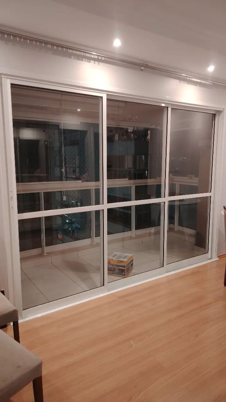 Three-panel sliding door