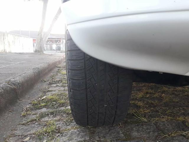 Vendo troco L200 HPE apenas 85 mil km diesel - Foto 10