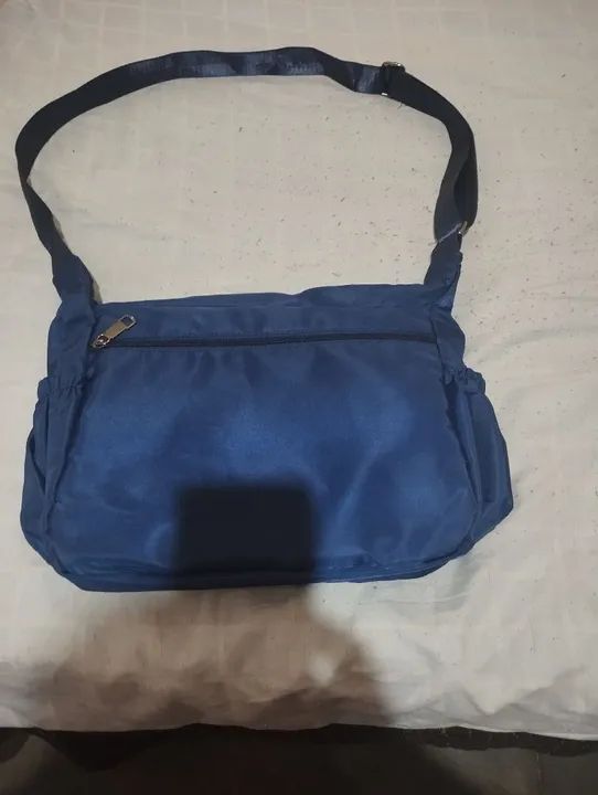 Eu estou vendendo uma bolsa novinha é só pegar é usar quem estiver enterecado  - Foto 3