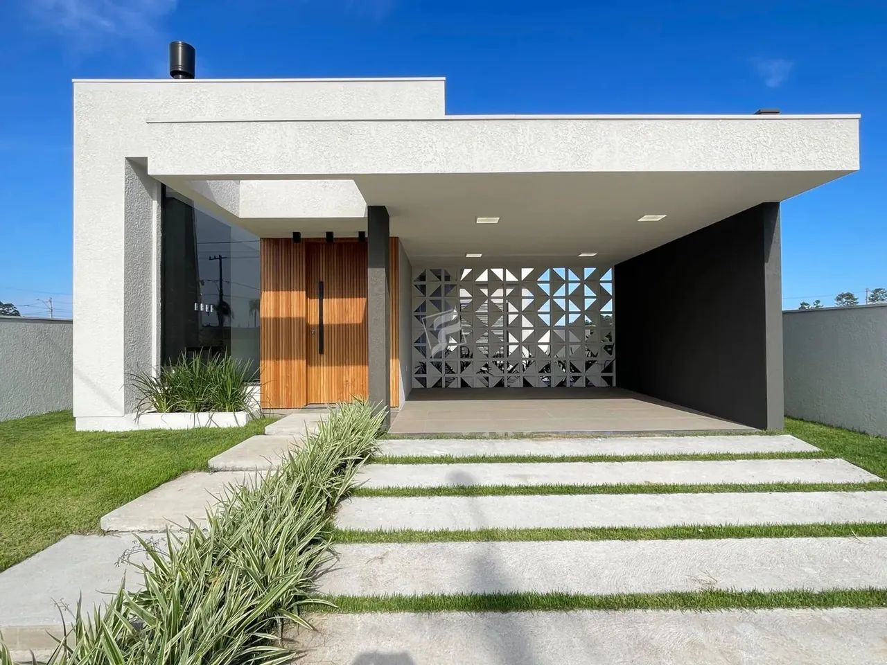 Encante-se com essa charmosa casa localizada no bairro Jardim América, em Passo de Torres  - Foto 2