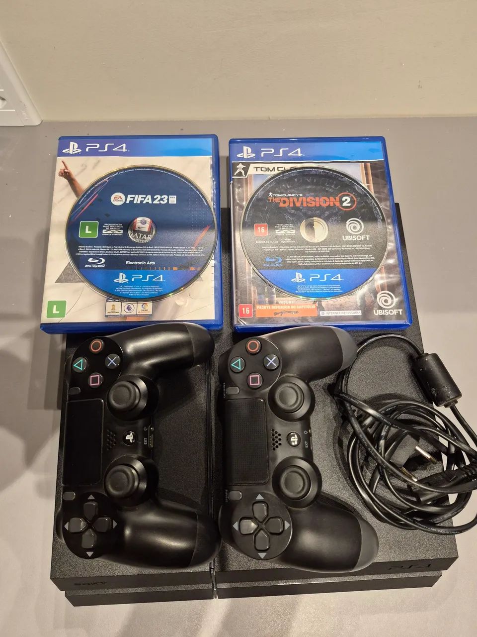 Vendo PlayStation 4 com 2 jogos - Foto 2