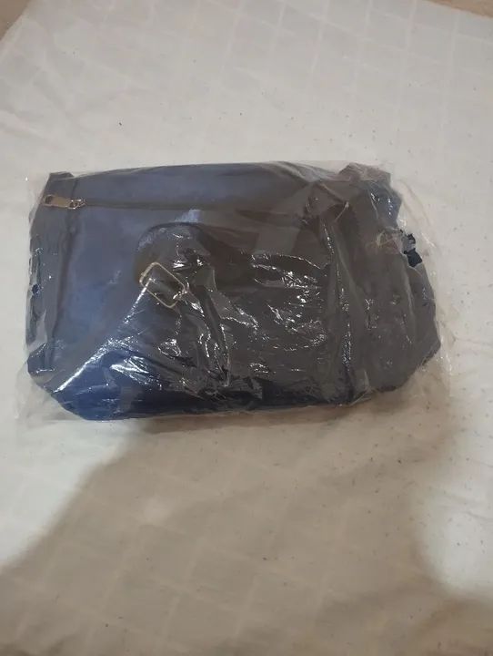 Eu estou vendendo uma bolsa novinha é só pegar é usar quem estiver enterecado  - Foto 6