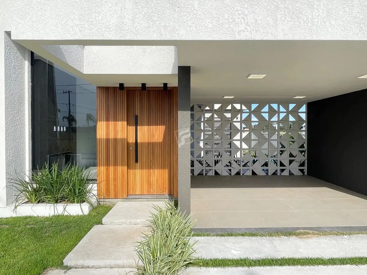 Encante-se com essa charmosa casa localizada no bairro Jardim América, em Passo de Torres 