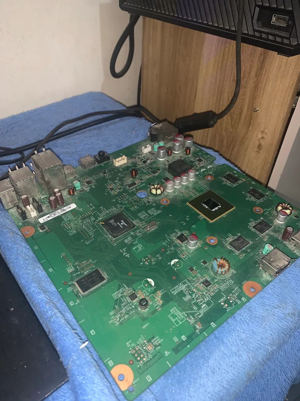Placa do Xbox 360 E, no estado