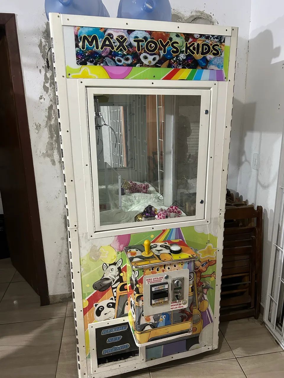 Vendo grua de pelúcia