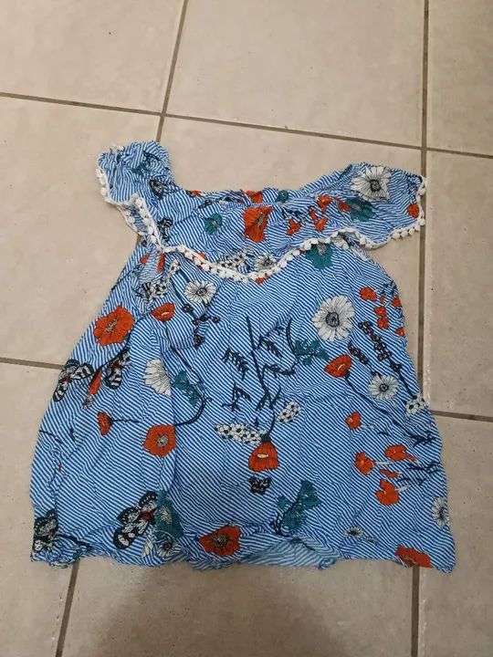 Blusa estampada xadrez e floral