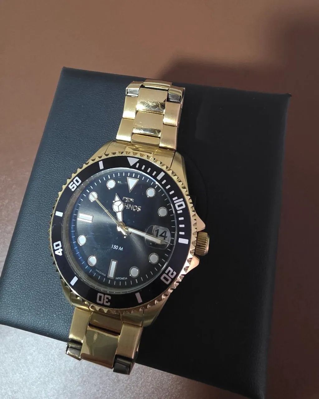 Relógio technos dourado 