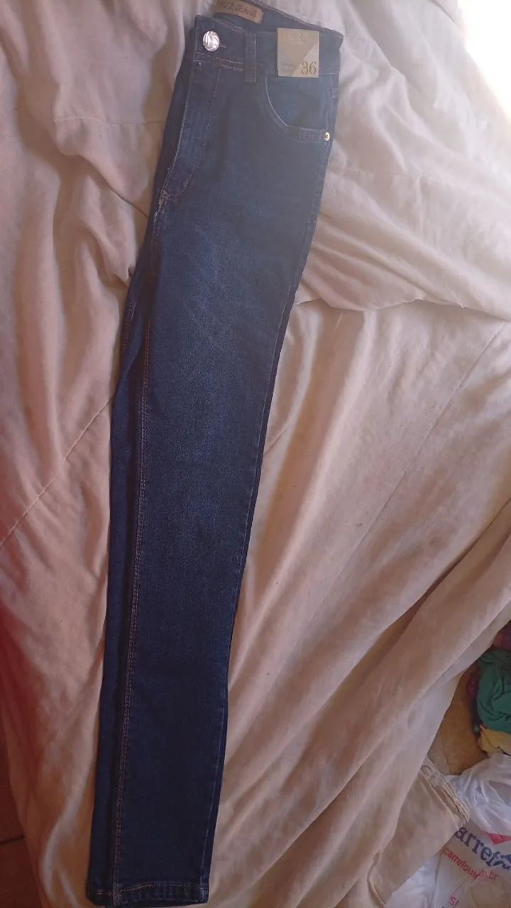 Calça jeans feminina tam 36  - Foto 4